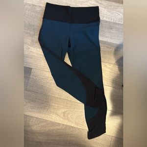 Lululemon leggings, teal blue and black. Size 8.